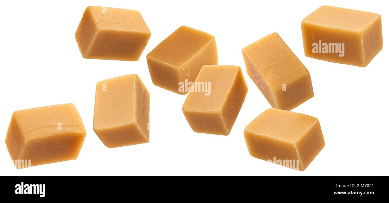 Caramel candies isolated on white background Stock Photo Alamy