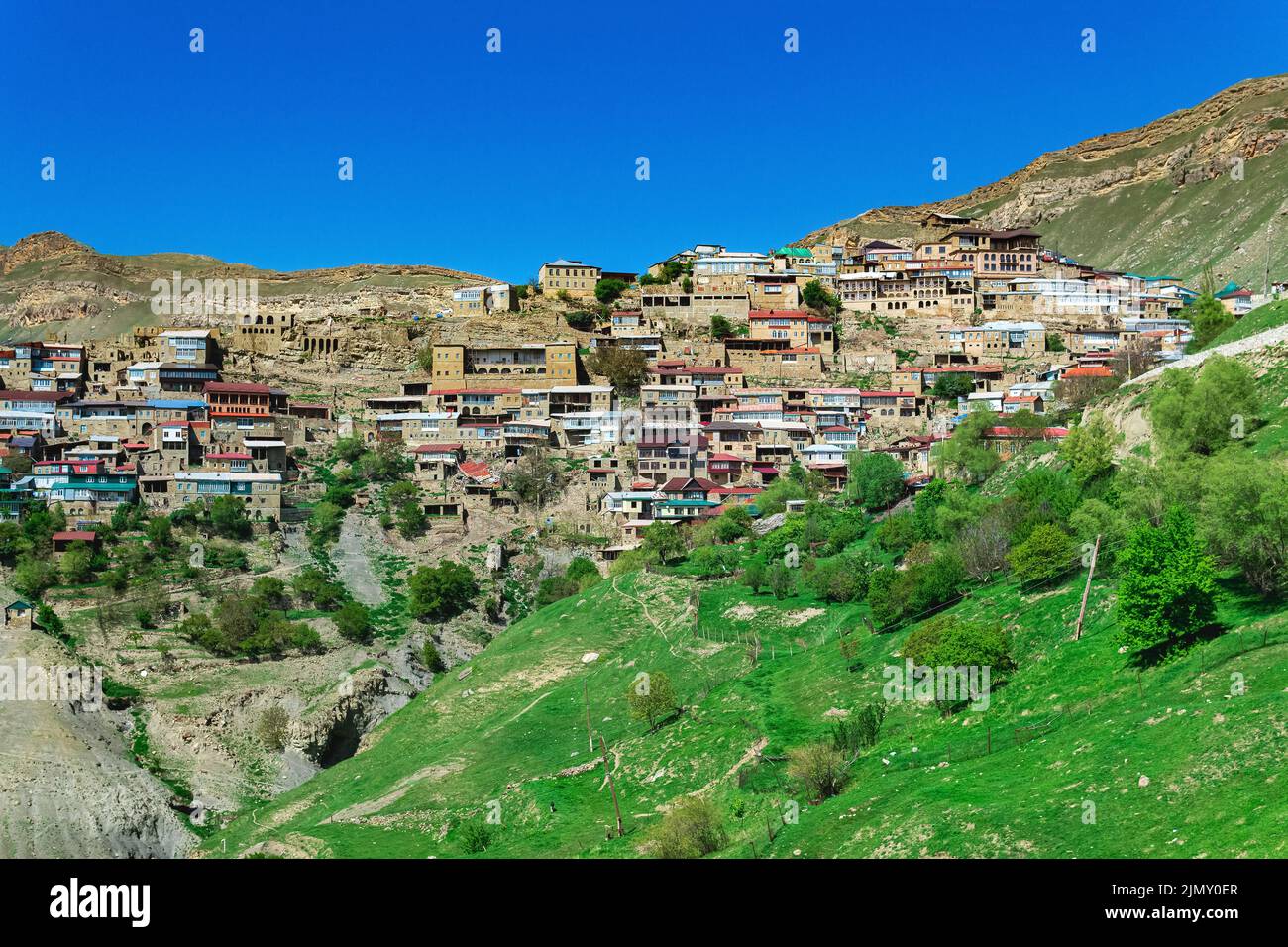 Village at mountain slope hi-res stock photography and images - Alamy