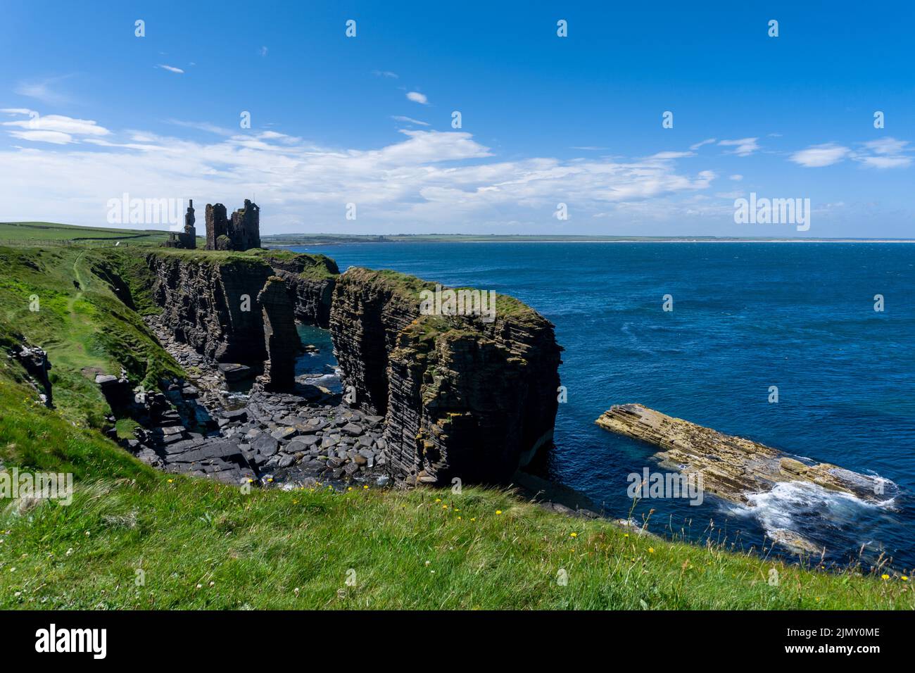 Wick, United Kingdom - 26 June, 2022: view of the Caithness coast and the ruins of the historic Castle Sinclair Girnigoe Stock Photo