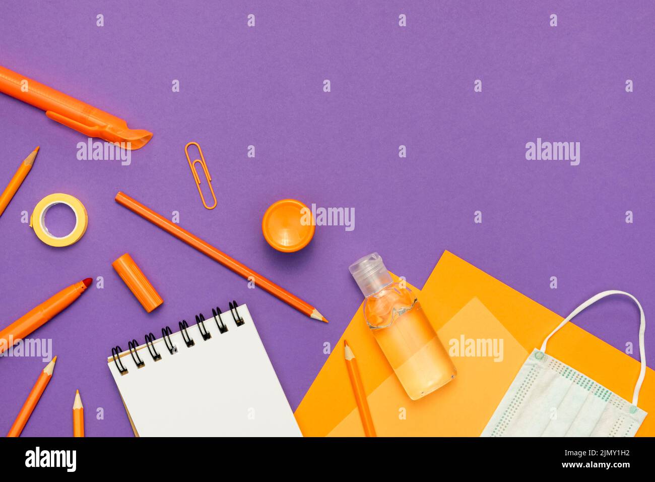 Supplies arrangement purple background Stock Photo