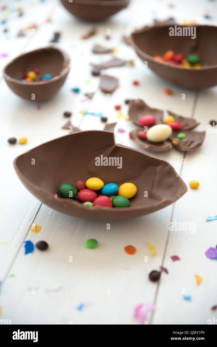 Small candies open chocolate egg Stock Photo