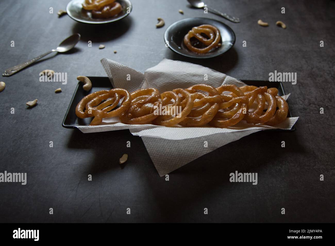 Popular Indian sweet jalebi or imarati made by deep frying in pure ghee