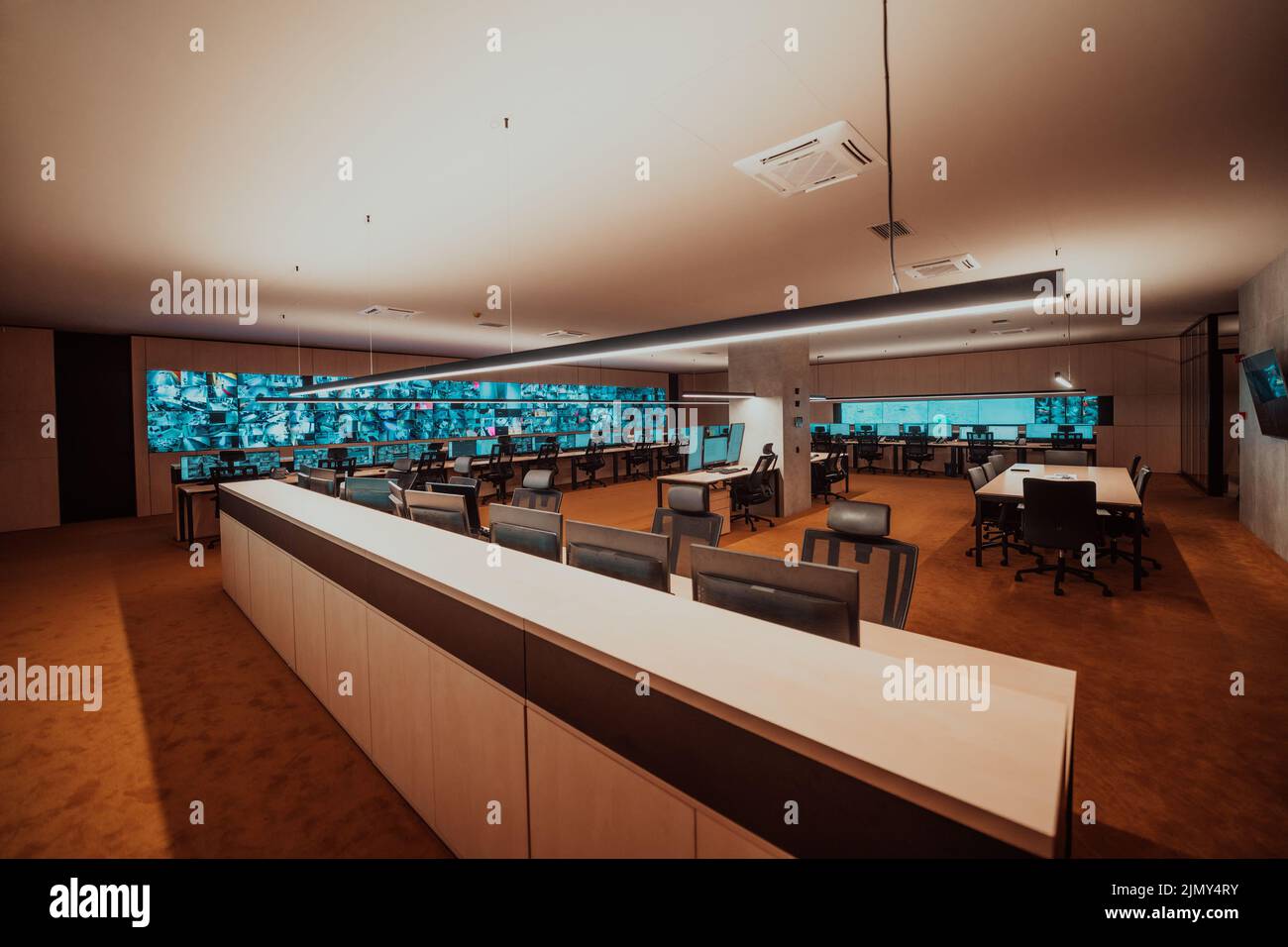 Security Room Dim Empty interior of big modern security system control room, workstation ...
