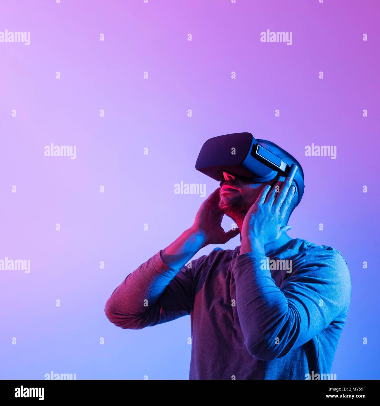 Man with futuristic device medium shot Stock Photo