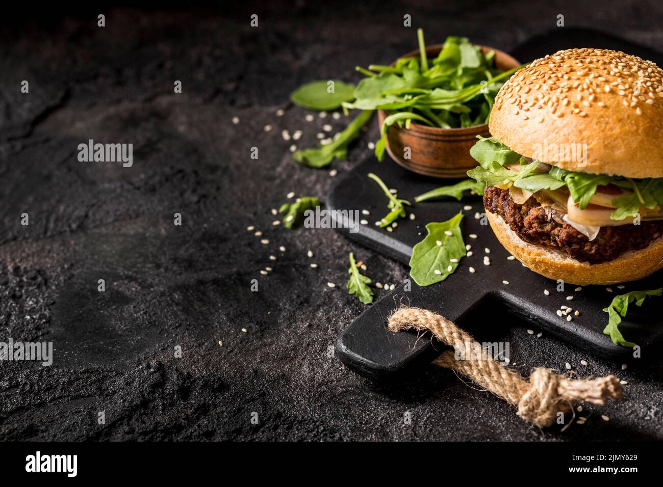 High angle bacon burger with salad copy space Stock Photo