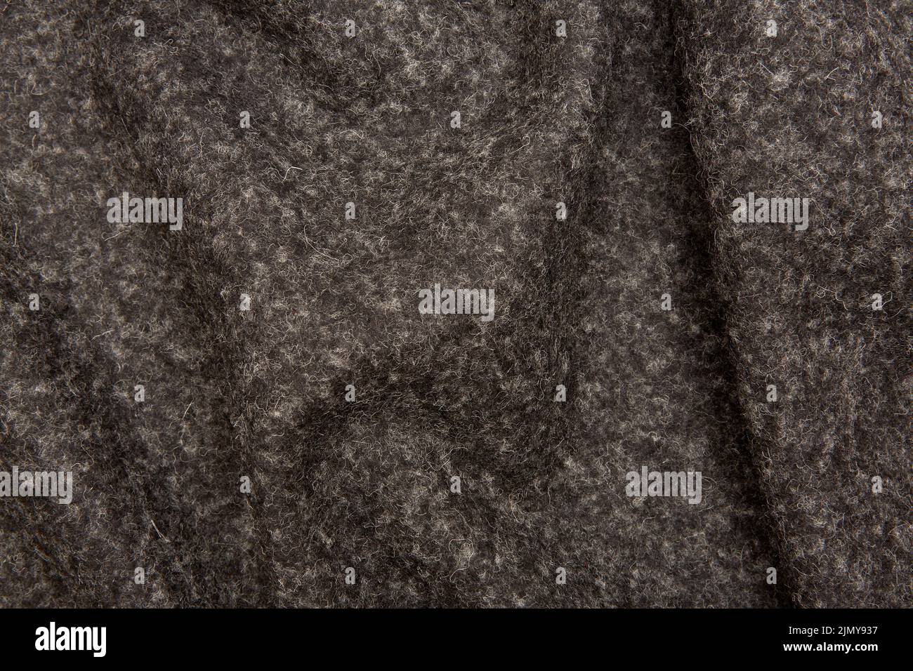 gray felt folded with a coarse structure Stock Photo