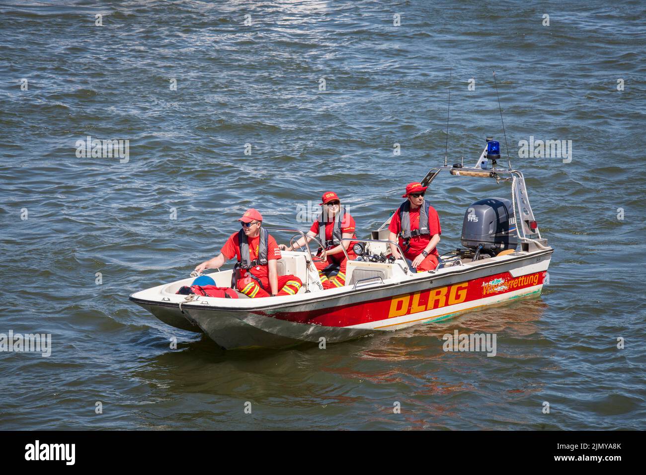 rescue boat of the German Life Saving Association DLRG  on the Rhine, Cologne, Germany. Rettungsboot der Deutsche Lebens-Rettungs-Gesellschaft DLRG au Stock Photo