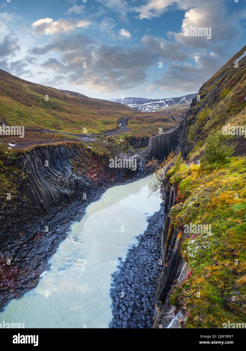 Autumn  picturesque Studlagil canyon is a ravine in Jokuldalur, Eastern Iceland. Famous columnar basalt rock formations and Jokl Stock Photo