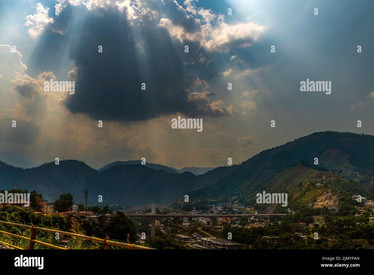 sun rays and clouds in the blue sky Stock Photo