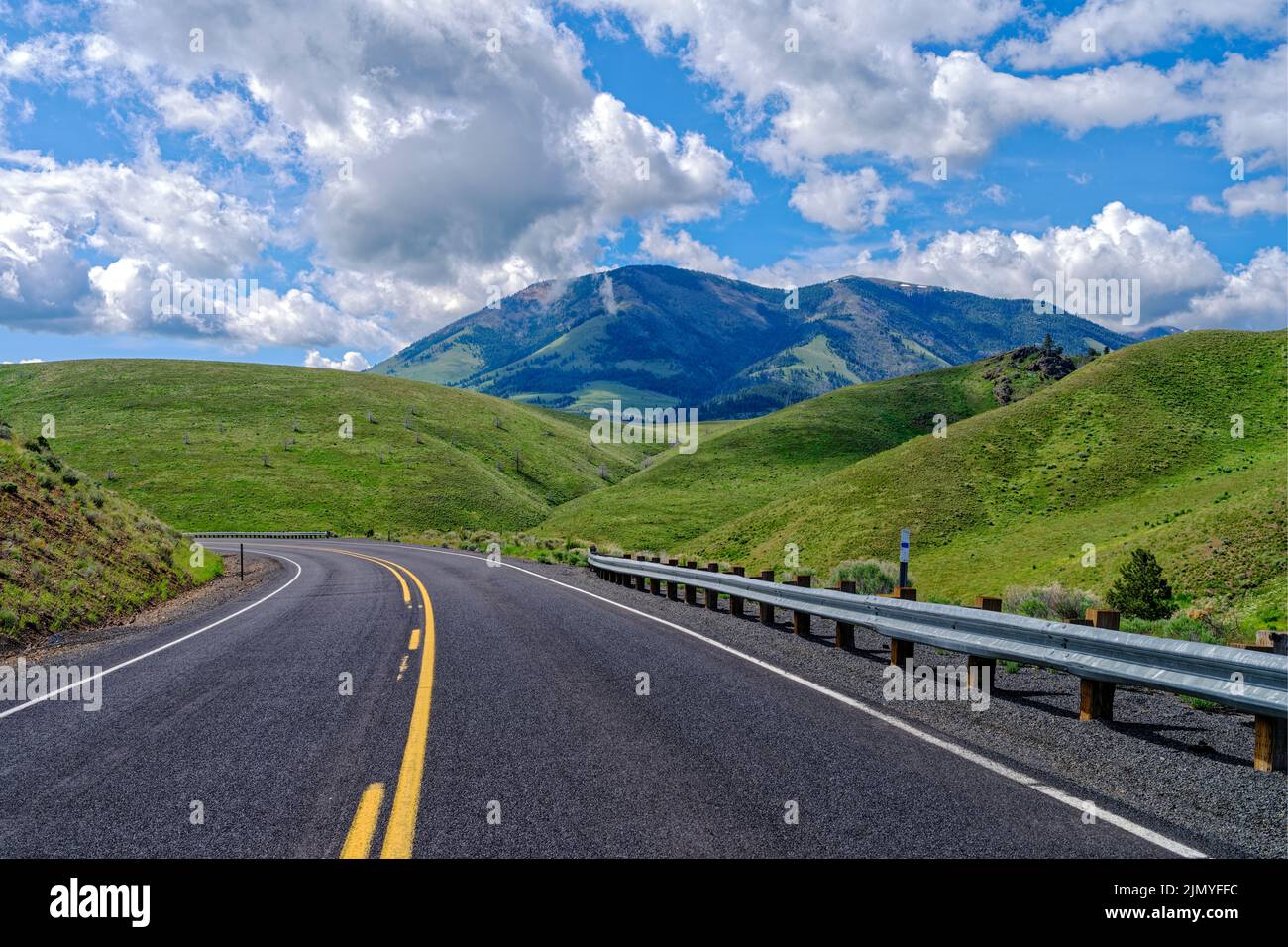 Highway 26 curves through verdant hills west of Ironside, Oregon, USA Stock Photo