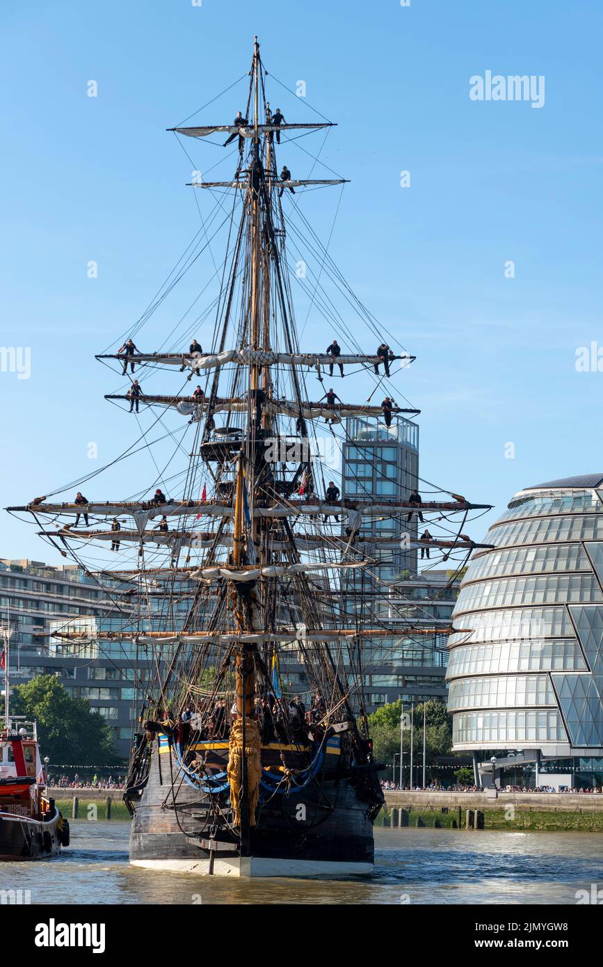 Tower Bridge, London, UK. 8th Aug, 2022. Gotheborg of Sweden is a sailing replica of the Swedish East Indiaman Gotheborg I, launched in 1738, and is visiting London to welcome visitors on board. The wooden replica ship was launched in 2003 and last visited London in 2007. It has navigated up the River Thames in the morning to pass under the opened Tower Bridge before turning and passing back under and heading for Thames Quay in Canary Wharf, where it will be open to visitors. Gotheborg turning above Tower Bridge to pass back under Stock Photo