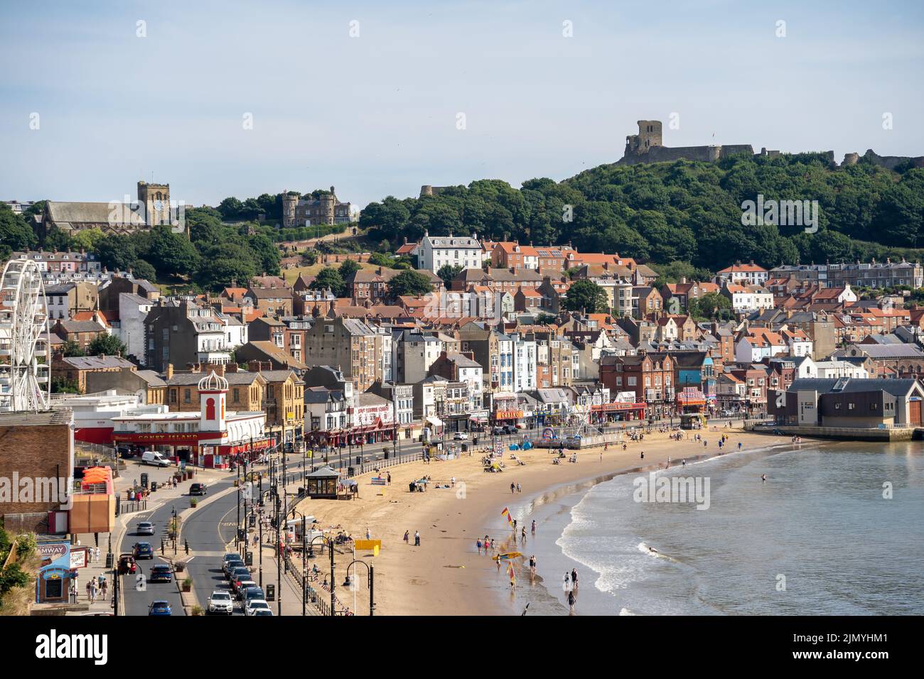 SCARBOROUGH,  NORTH YORKSHIRE, UK - JULY 18: View of the sea front in Scarborough, North Yorkshire on July 18, 2022. Unidentifie Stock Photo