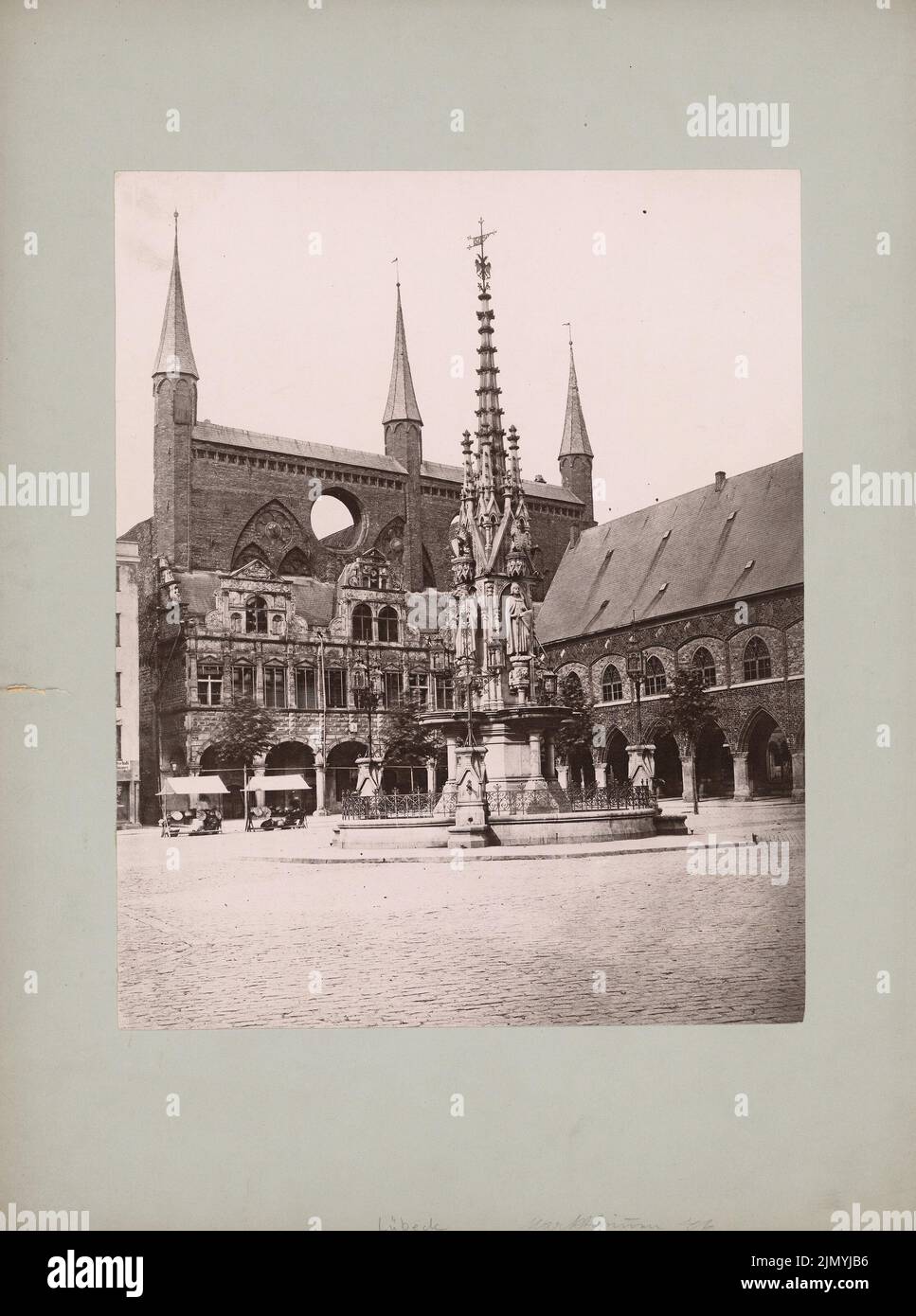 Unknown photographer, Marktbrunnen in Lübeck (without date): View Marktbrunnen (torn down), in the background of Marienkirche and town hall. Photo, 40.3 x 30 cm (including scan edges) Stock Photo