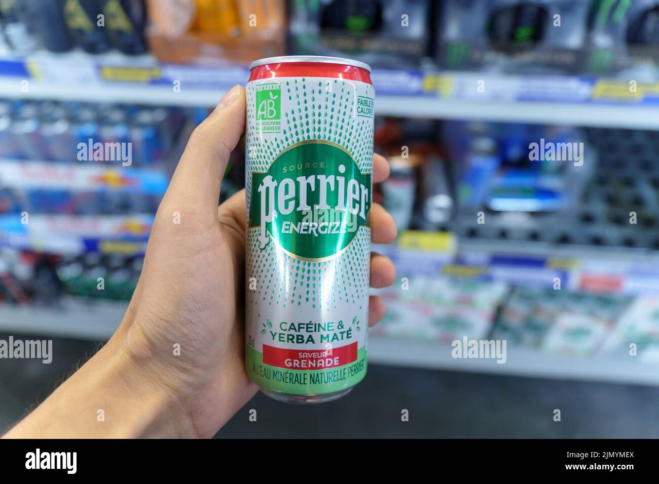 Tyumen, Russia-June 30, 2022: Perrier is a French brand of premium mineral water, energize caffeine yerba mate Stock Photo