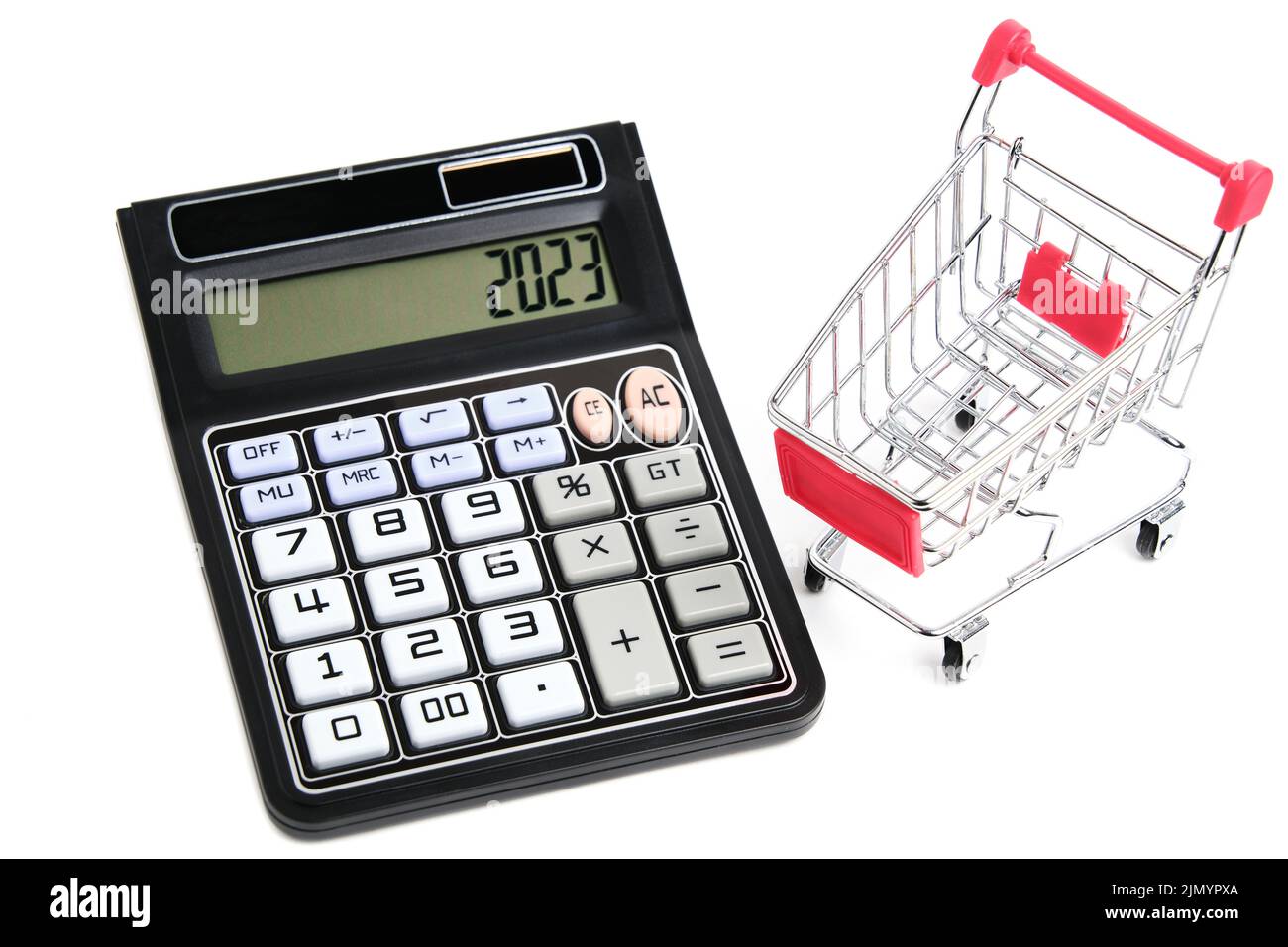 Calculator and shopping cart on white background.Concept of shopping