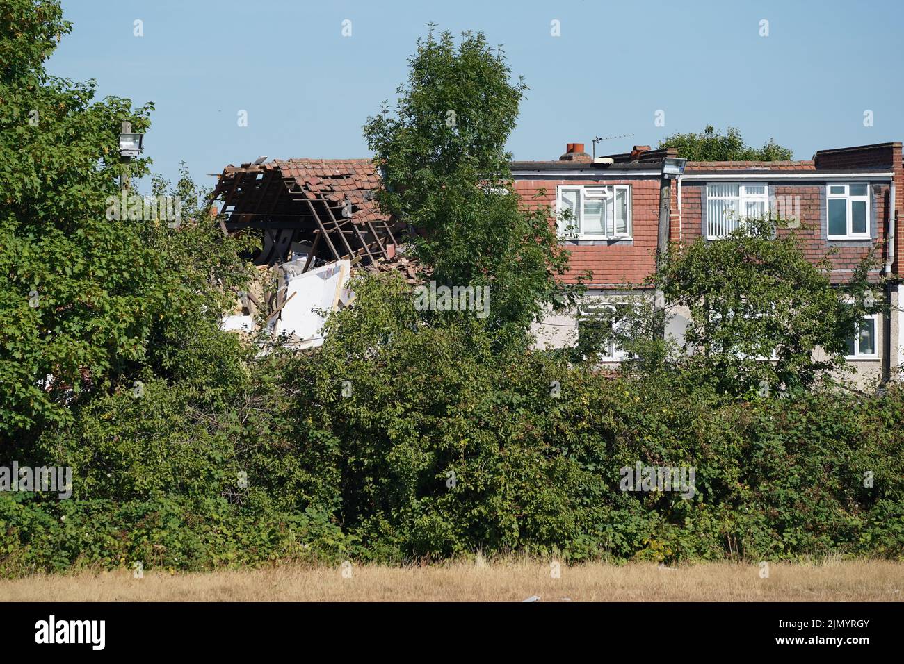The scene in Galpin's Road in Thornton Heath, south London, where the London Fire Brigade (LFB) report that a house has collapsed amid a fire and explosion. Picture date: Monday August 8, 2022. Stock Photo