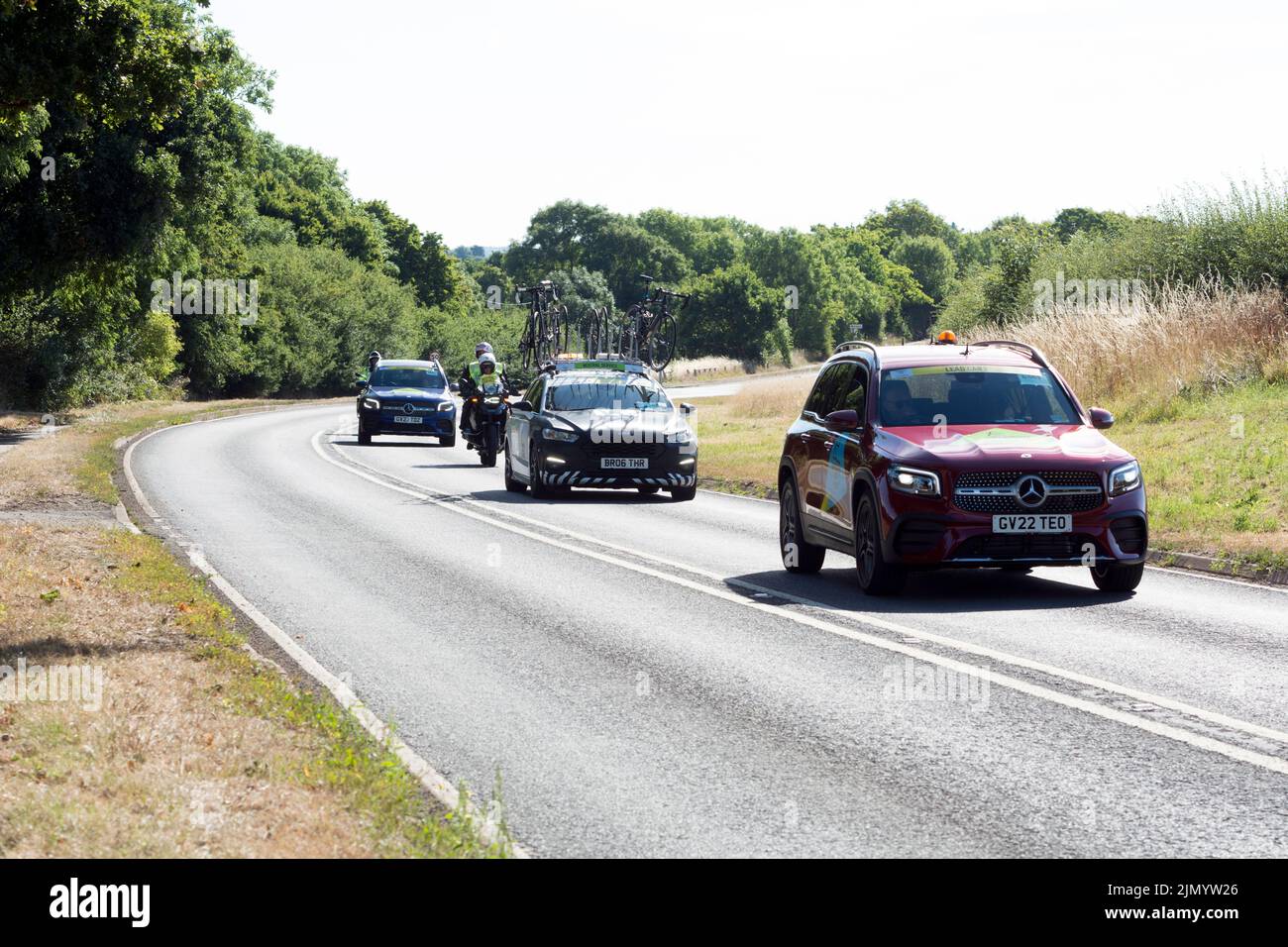 Support vehicles for the 2022 Commonwealth Games cycling road race, Warwick, UK Stock Photo