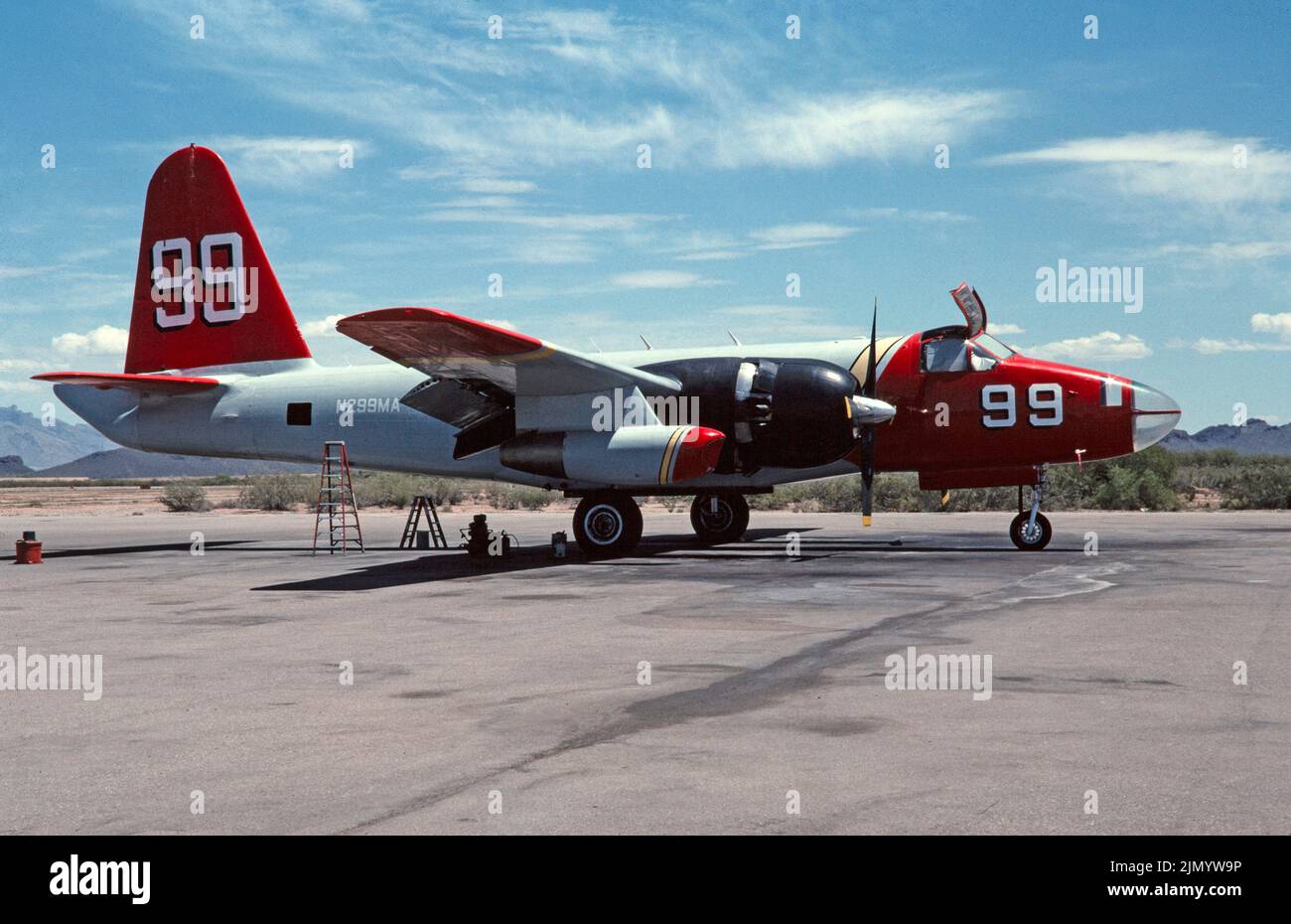 A Lockheed P-2 Neptune Aircraft, N299MA, used as a water Tanker for aerial fire fighting, at Marana Airport in Arizona, USA, in September 1993. Destroyed in a fatal crash in 2003. Stock Photo