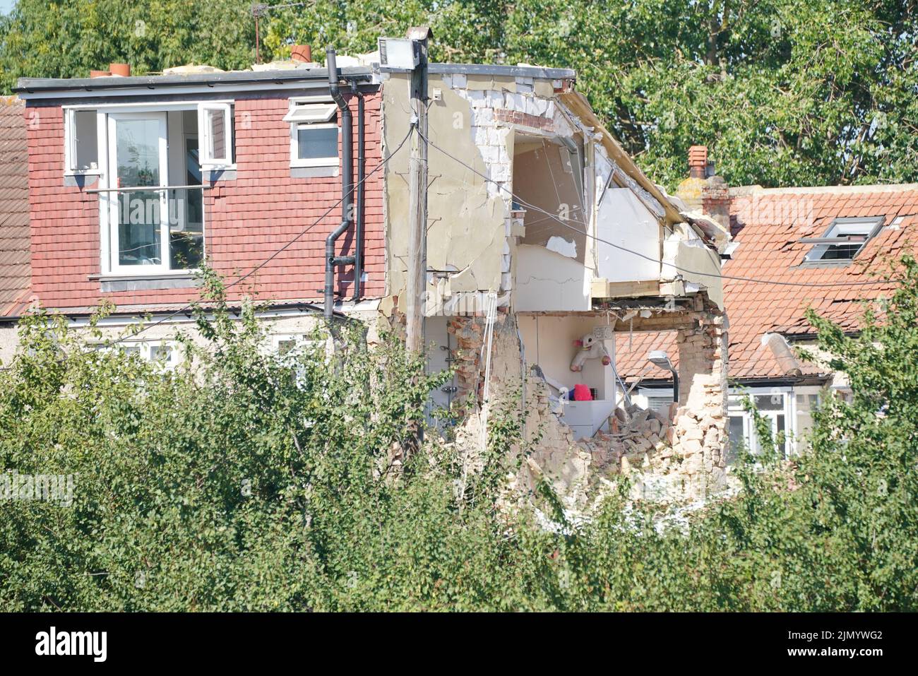 The scene in Galpin's Road in Thornton Heath, south London, where a house has collapsed amid a fire and explosion. Picture date: Monday August 8, 2022. Stock Photo