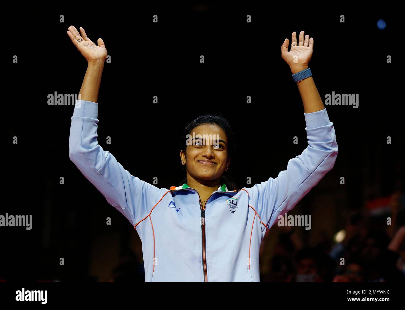 Commonwealth Games - Badminton - Women's Singles - Medal Ceremony - The NEC Hall 5, Birmingham, Britain - August 8, 2022 Gold Medallist India's Venkata Sindhu Pusarla celebrates on the podium during the medal ceremony REUTERS/Jason Cairnduff Stock Photo