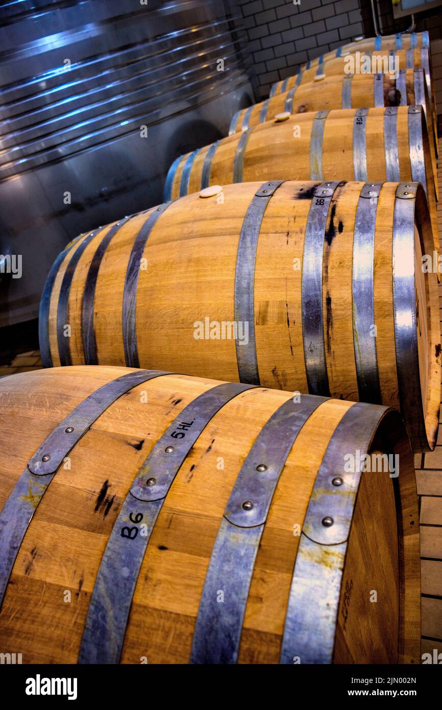 Wooden wine barrels stored underground Stock Photo Alamy
