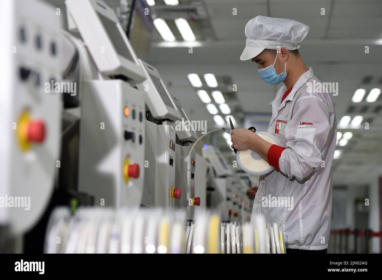 Hefei. 5th Mar, 2020. Photo taken on March 5, 2020 shows a worker at the manufacturing shop of LCFC (Hefei) Electronics Technology Co., Ltd. in Hefei, capital of east China's Anhui Province. Credit: Zhou Mu/Xinhua/Alamy Live News Stock Photo