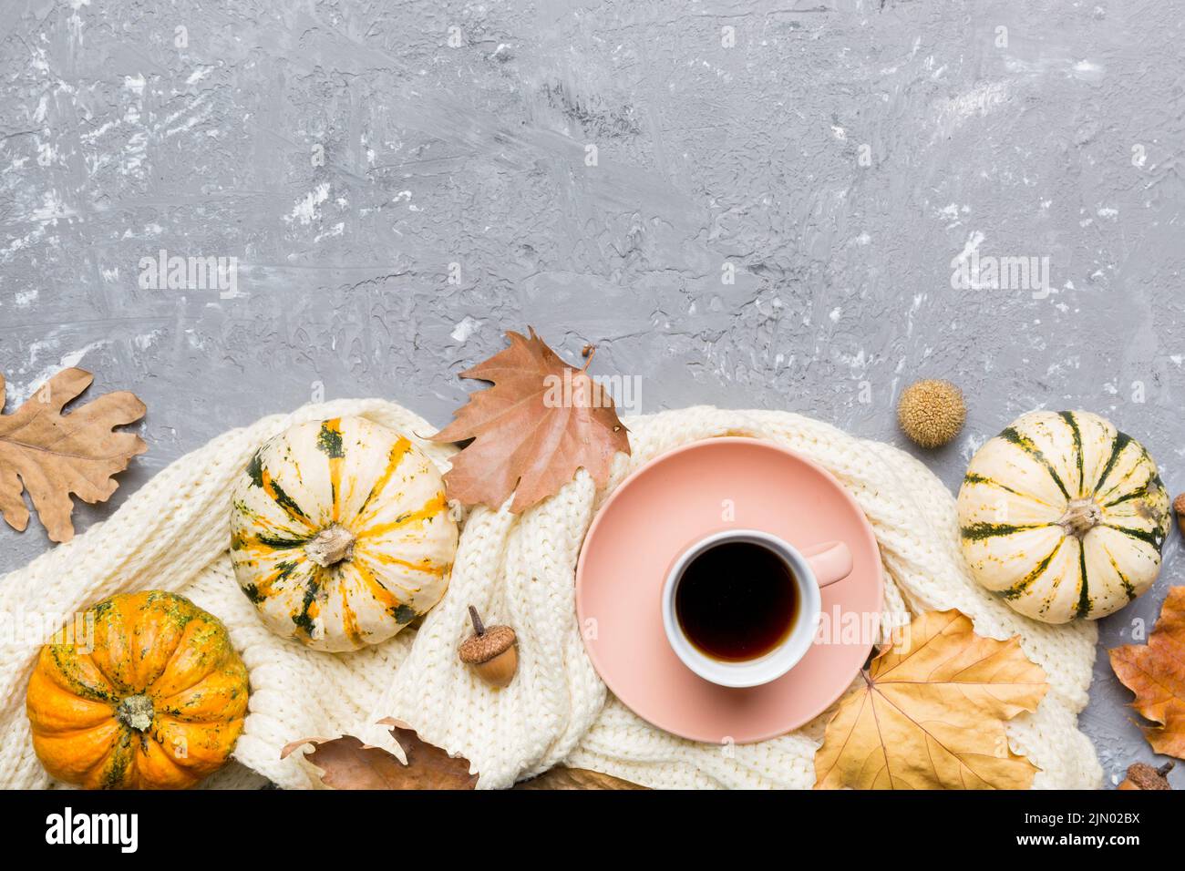 Flat lay composition with colorful Autumn cup of coffee and leaves on a ...
