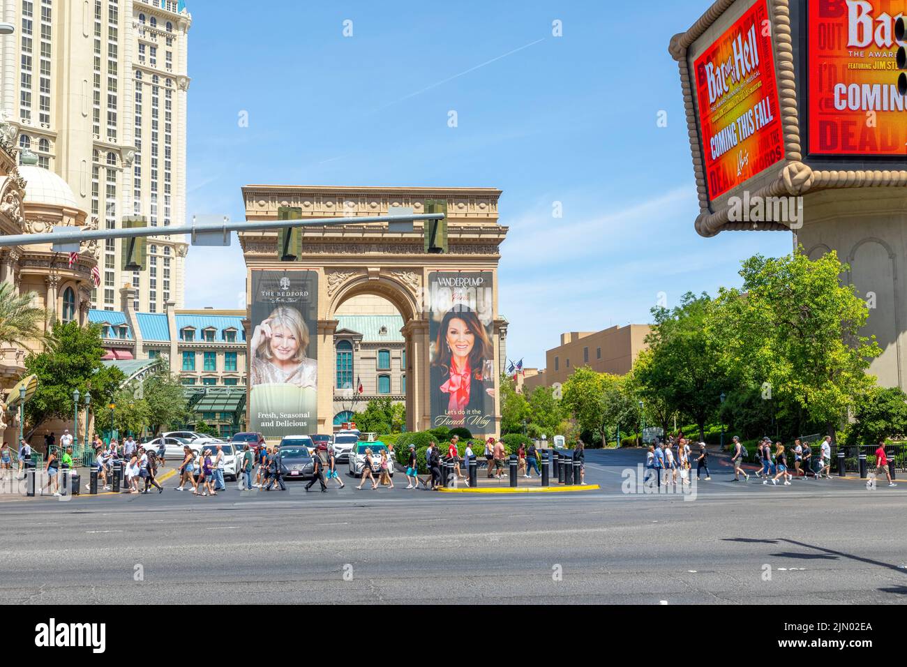 Las Vegas, USA - May 23, 2022: the replica of the triumphal arch in Las Vegas at the strip with people crossing the street at the strip. Stock Photo