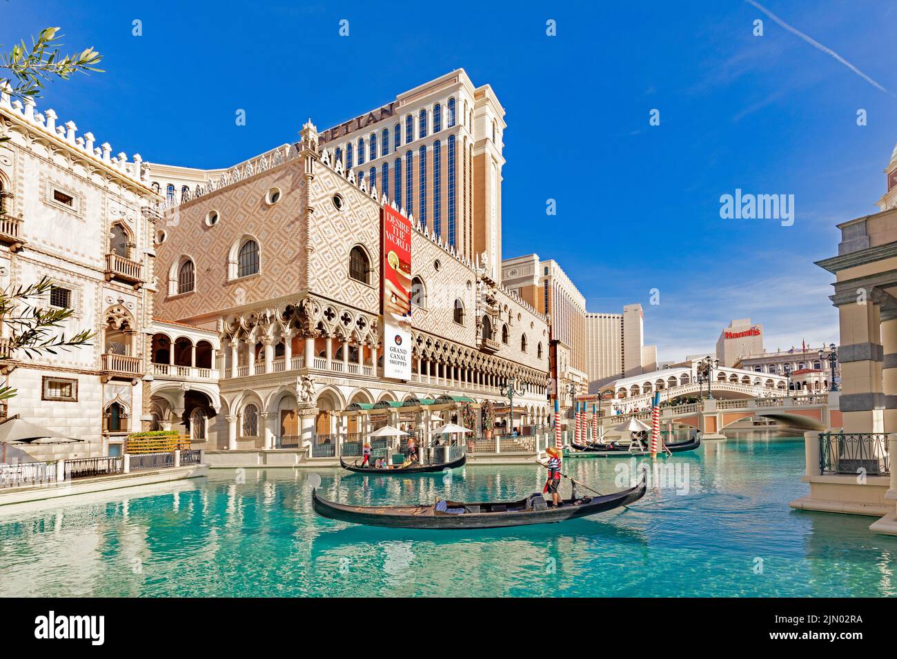 Las Vegas, USA - May 23, 2022:  gondola with tourists at The Venetian Resort Hotel and Casino. The resort opened  1999 with flutter of white doves, si Stock Photo