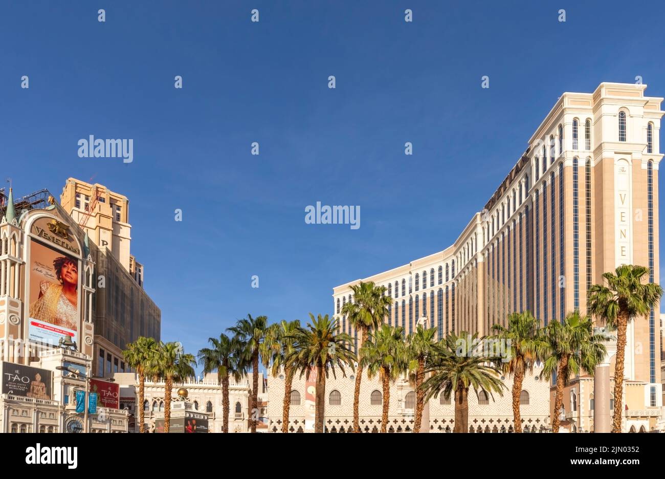 Las Vegas, USA - May 23, 2022: view of the Venetian Hotel and casino with palm trees in front. Stock Photo