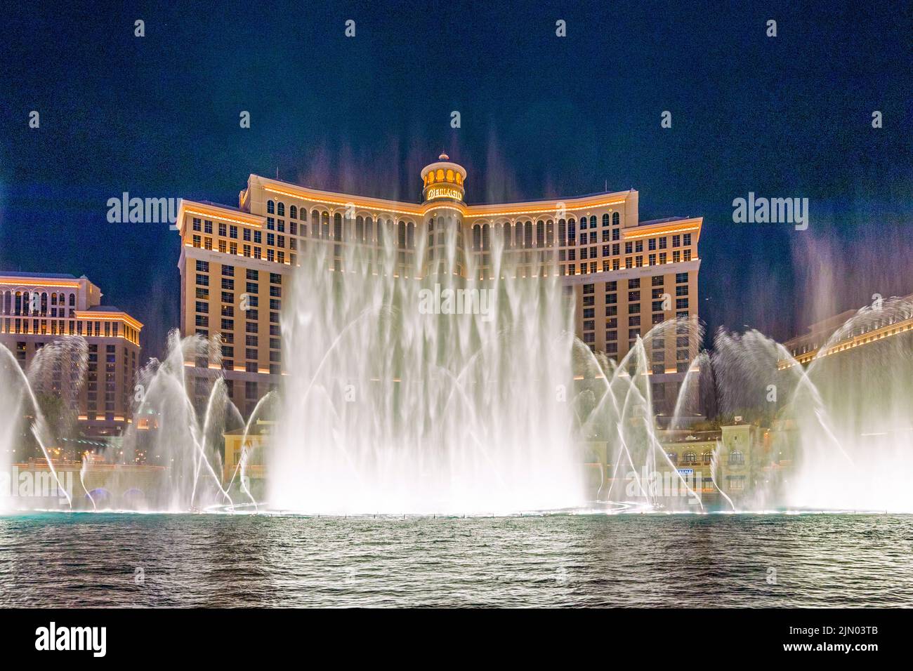 Las Vegas, Nevada, USA -May 23, 2022 : The Fountains of Bellagio at night. This feature performs choreography with water, music and light in front of Stock Photo