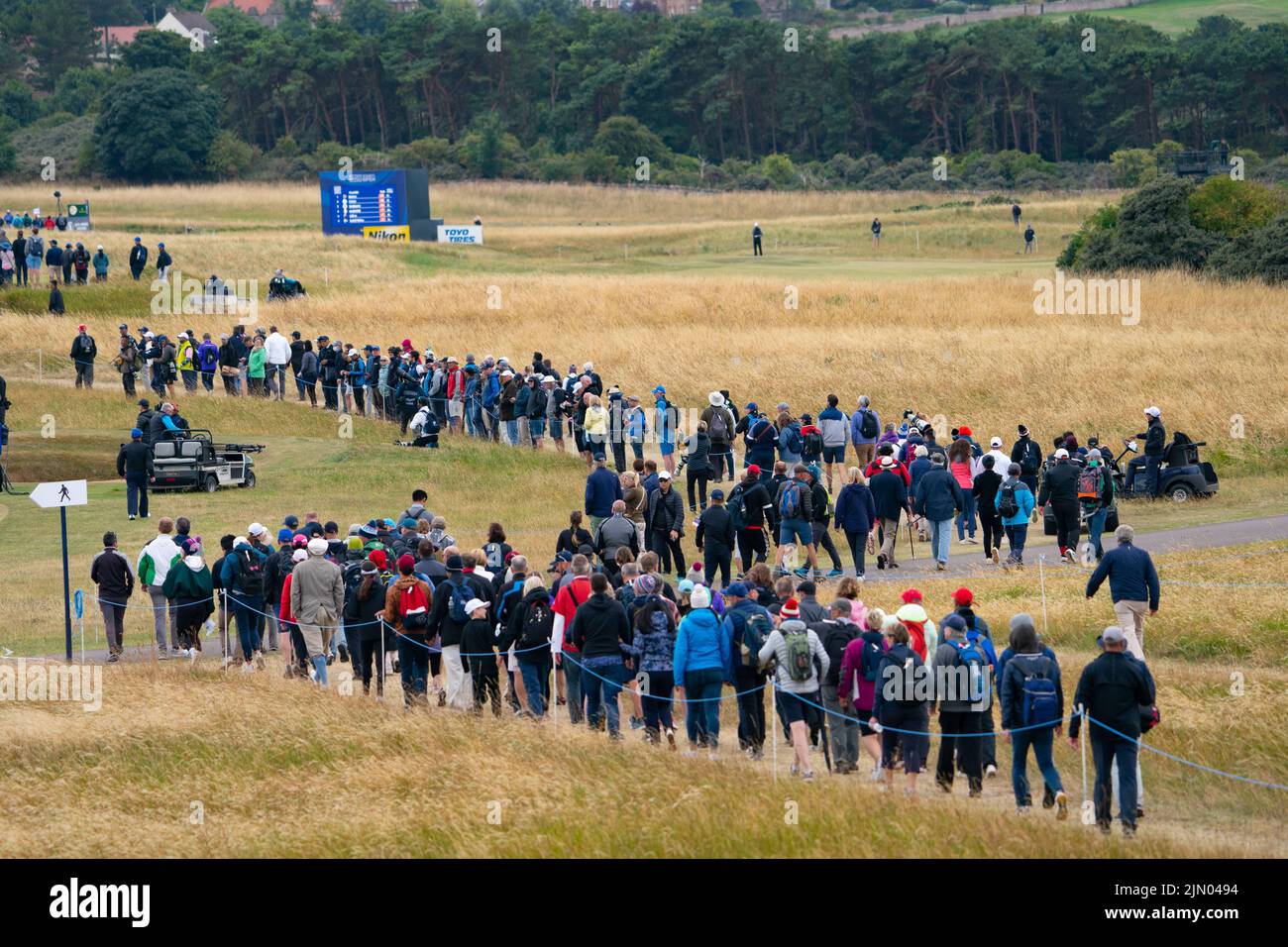Gullane, Scotland, UK. 7th August 2022. Final  round of the AIG Women’s Open golf championship at Muirfield in Gullane, East Lothian. Pic;  Crowds of spectators make their way down the 14th fairway. Iain Masterton/Alamy Live News Stock Photo