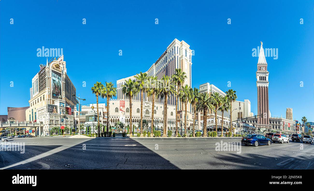Las Vegas, USA - May 24, 2022: view to hotels and casinos at the Strip in daytime with neon advertising. Stock Photo
