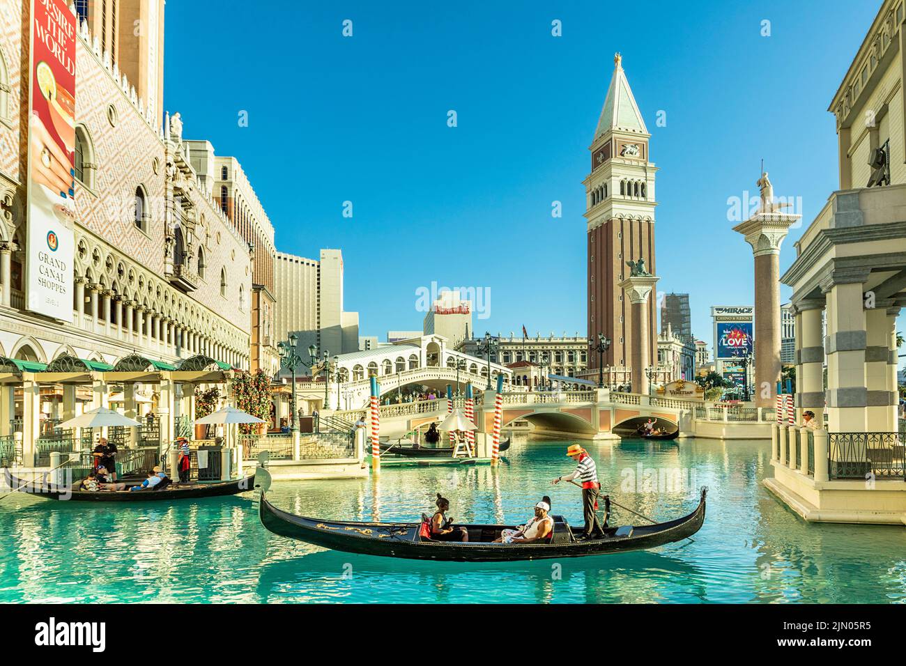 Las Vegas, USA - May 24, 2022: people enjoy a gondola ride at the Hotel and Casino The Venetian with singing gondolieres. Stock Photo