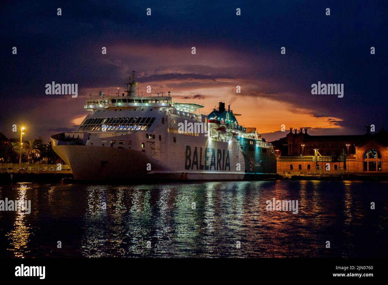 A ferry ship of the  Spanish shipping company Balearia is seen docked at Barcelona Port Vell, Spain. Stock Photo