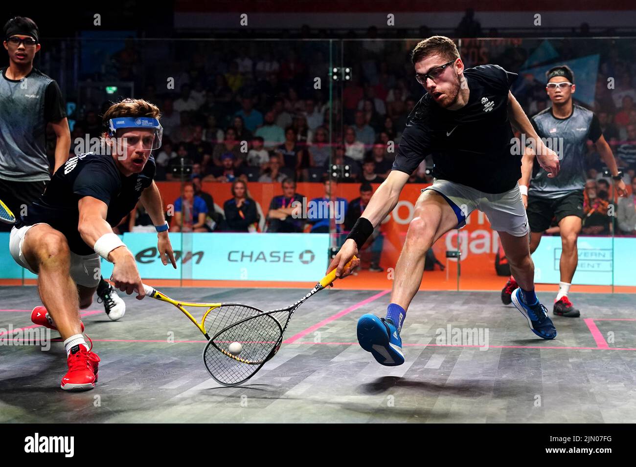Scotland's Greg Lobban (second left) and Rory Stewart during the Men's Squash Doubles Bronze Medal Match against Malaysia's Yow Eain and Chee Wern Yuen at the University of Birmingham Hockey and Squash Centre on day eleven of the 2022 Commonwealth Games in Birmingham. Picture date: Monday August 8, 2022. Stock Photo