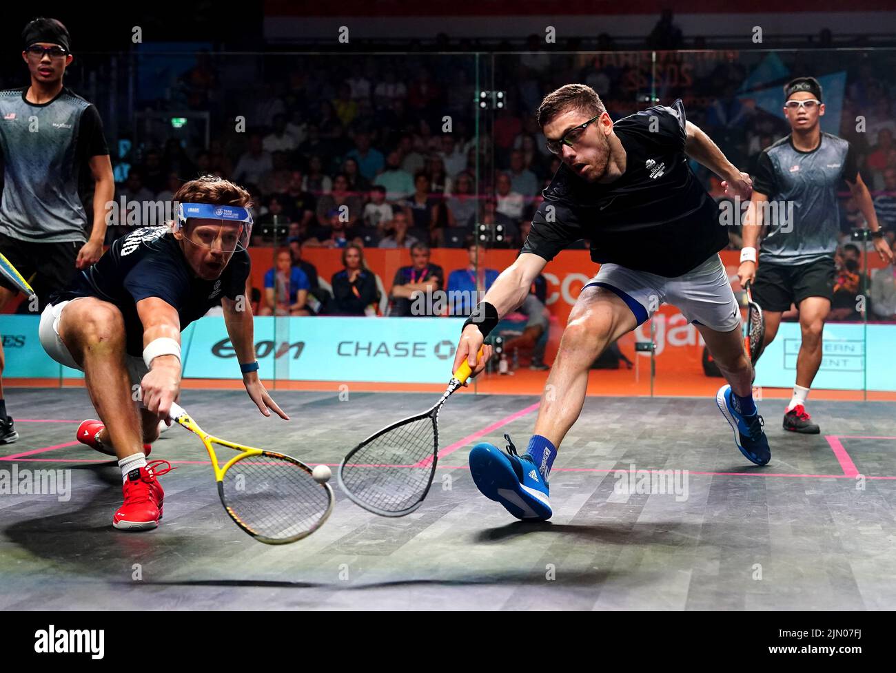 Scotland's Greg Lobban (second left) and Rory Stewart during the Men's Squash Doubles Bronze Medal Match against Malaysia's Yow Eain and Chee Wern Yuen at the University of Birmingham Hockey and Squash Centre on day eleven of the 2022 Commonwealth Games in Birmingham. Picture date: Monday August 8, 2022. Stock Photo