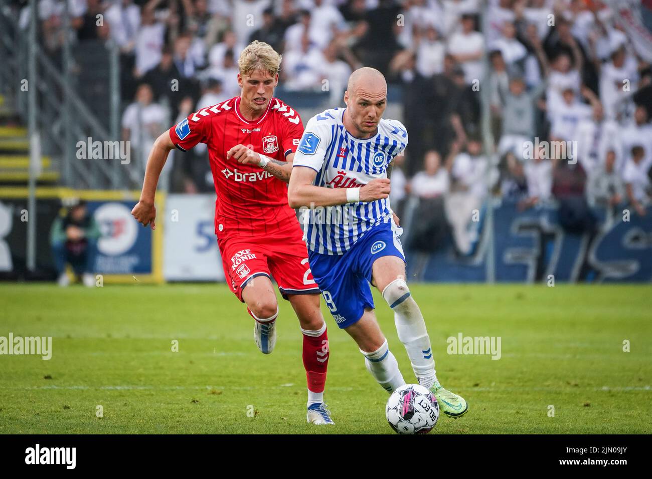 Odense, Denmark. 07th Aug, 2022. Aron Elis Thrandarson (19) of OB and Albert Gronbaek (27) of Aarhus GF seen during the 3F Superliga match between Odense Boldklub and Aarhus GF at Nature Energy Park in Odense. (Photo Credit: Gonzales Photo/Alamy Live News Stock Photo