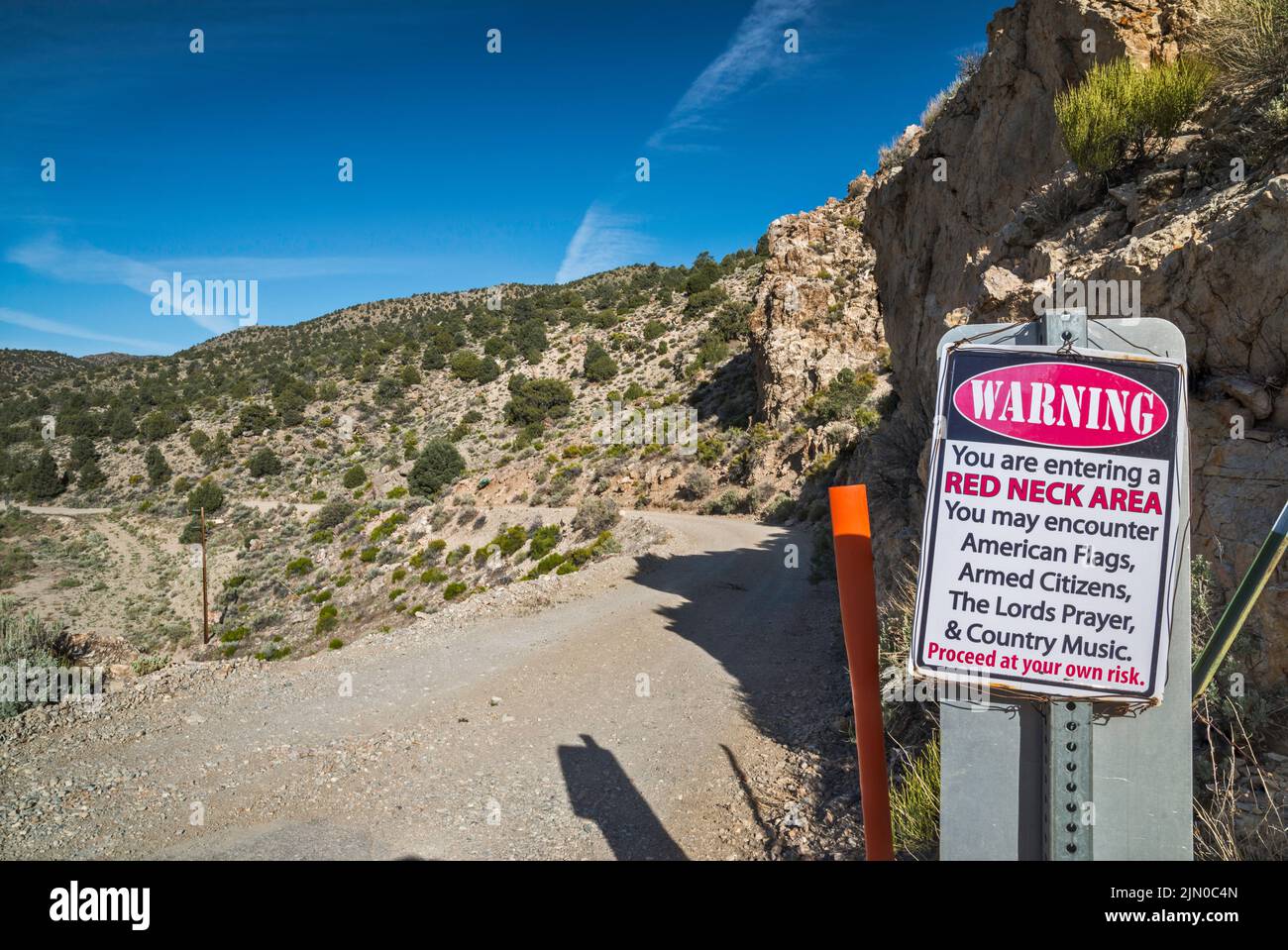 Warning sign, Cherry Creek Canyon, from Basin and Range Natl Monument, near ghost town of Adaven, Grant Range, Humboldt Toiyabe Natl Forest, Nevada Stock Photo