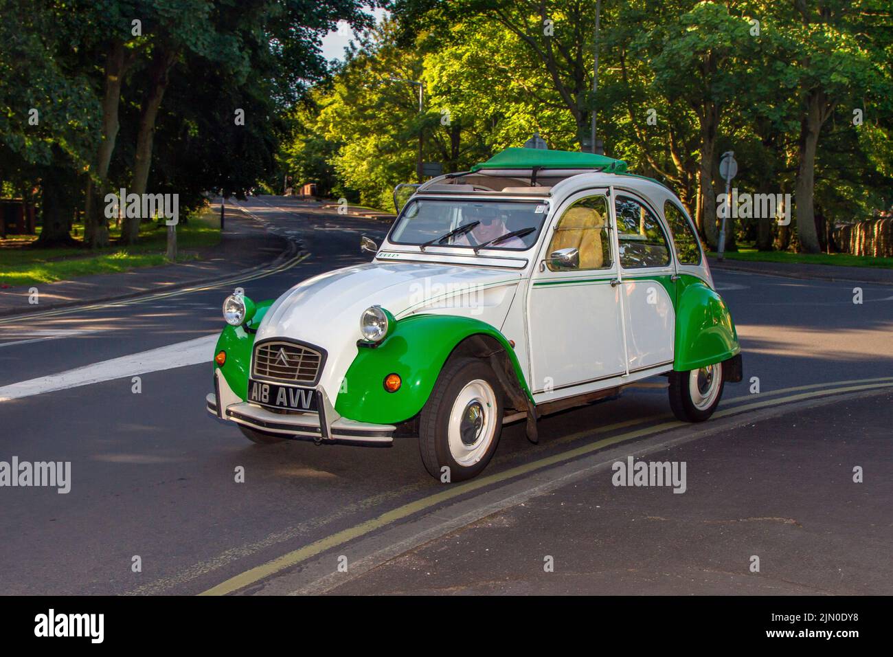 1990 90s, nineties green white CITROEN 2CV 802cc Fench vintage petrol automobile; Cars and motorcycles on display at the 13th Lytham Hall Summer Classic Car & Motorcycle Show, a Classic Vintage Collectible Transport Festival. Stock Photo