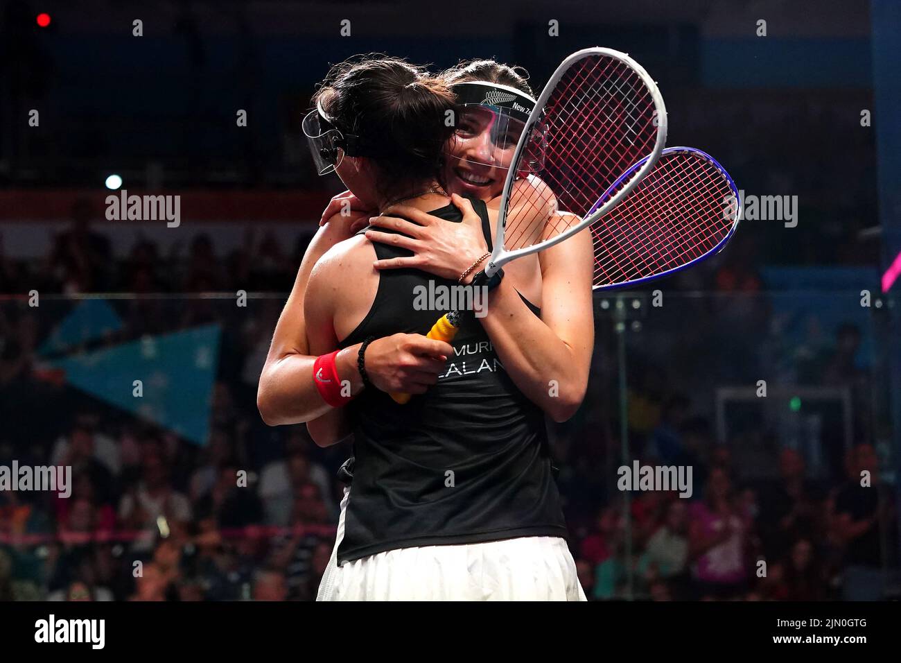 New Zealand's Joelle King and Amanada Landers-Murphy celebrate winning gold in the Women's Squash Doubles Gold medal match against England's Sarah-Jane Perry and Alison Waters at the University of Birmingham Hockey and Squash Centre on day eleven of the 2022 Commonwealth Games in Birmingham. Picture date: Monday August 8, 2022. Stock Photo
