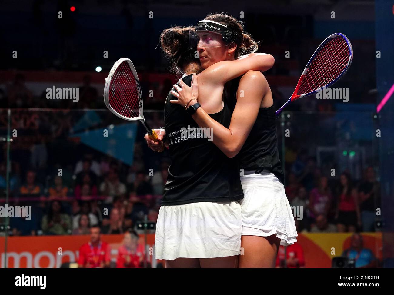 New Zealand's Joelle King and Amanada Landers-Murphy celebrate winning gold in the Women's Squash Doubles Gold medal match against England's Sarah-Jane Perry and Alison Waters at the University of Birmingham Hockey and Squash Centre on day eleven of the 2022 Commonwealth Games in Birmingham. Picture date: Monday August 8, 2022. Stock Photo