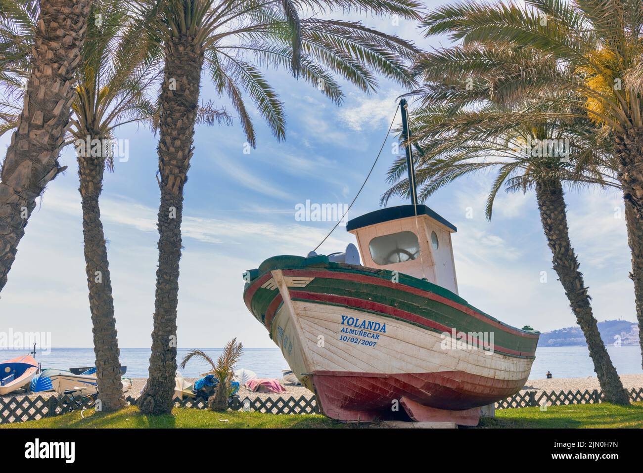 Almunecar, Costa Tropical, Granada Province, Andalusia, southern Spain.  Boat mounted as homage to the traiñas, the vessels which fished for horse mac Stock Photo