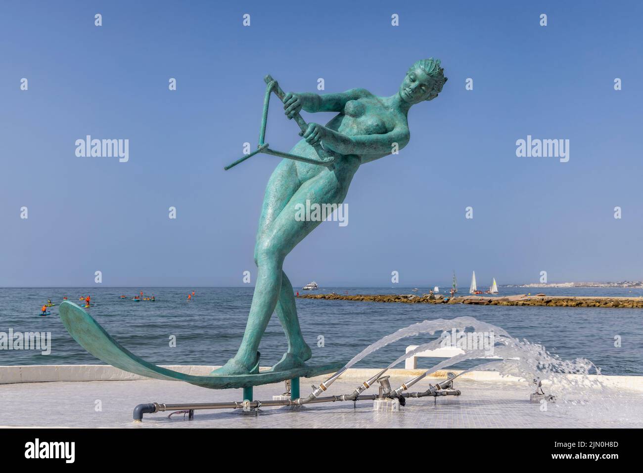 Marbella, Costa del Sol, Malaga Province, Andalusia, southern Spain. The waterskiing Venus statue on Playa de El Faro.  The statue was sculpted by Spa Stock Photo