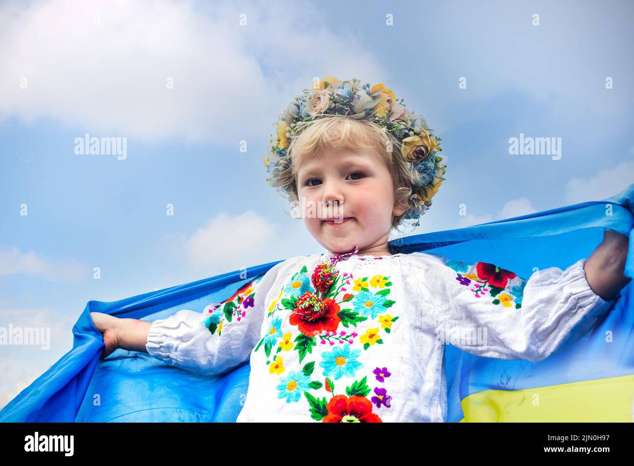 Ukrainian flag blue and yellow flag of Ukraine in hands of happy girl Ukrainian. Independence Day. Flag Day. Constitution day Stock Photo