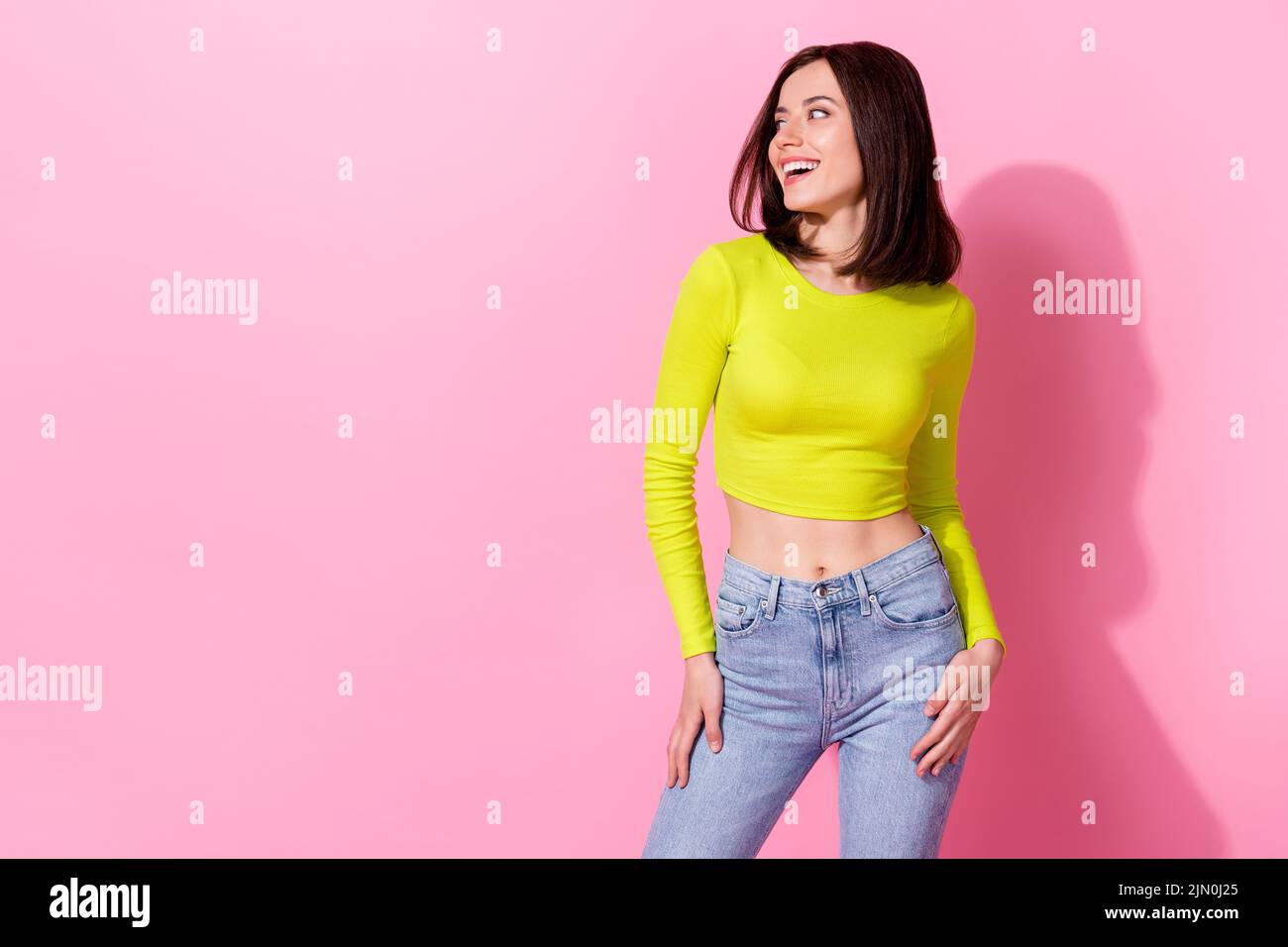 Photo of stunning dreamy lady wear yellow top looking empty space isolated pink color background Stock Photo
