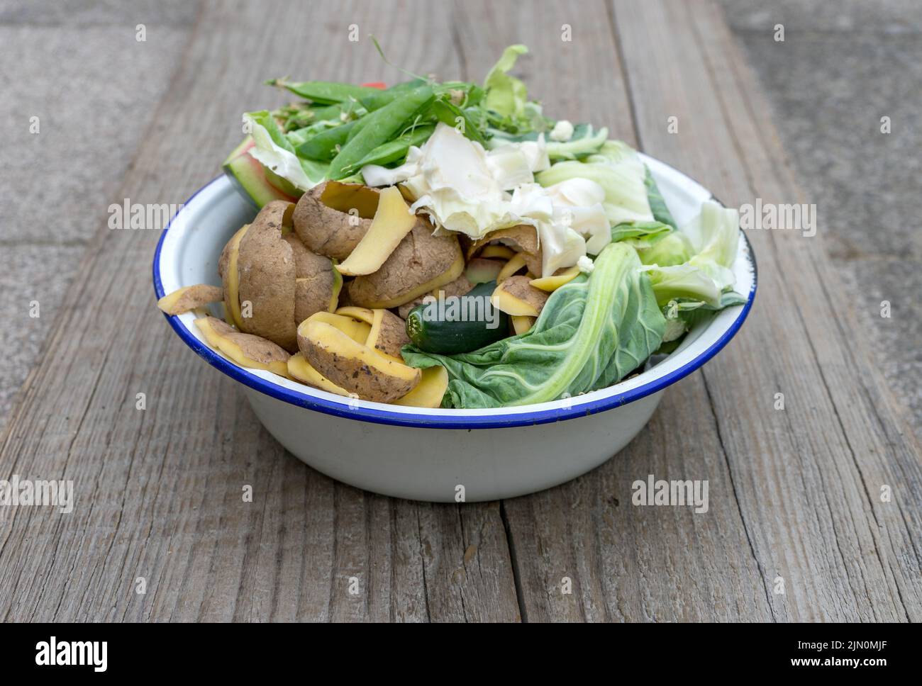 White bowl with organic waste Stock Photo