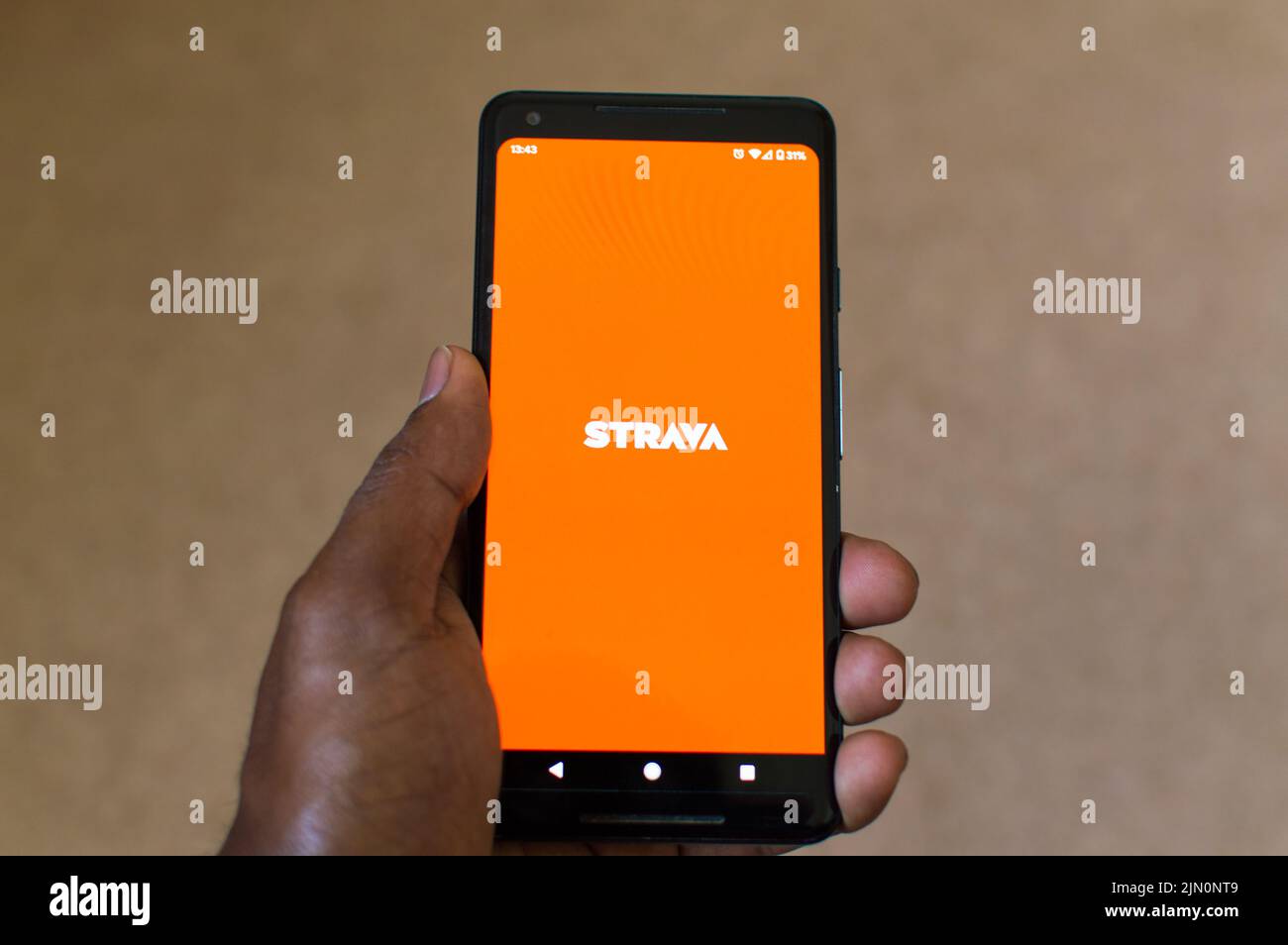 Strava physical activity tracking app on smartphone Stock Photo Alamy