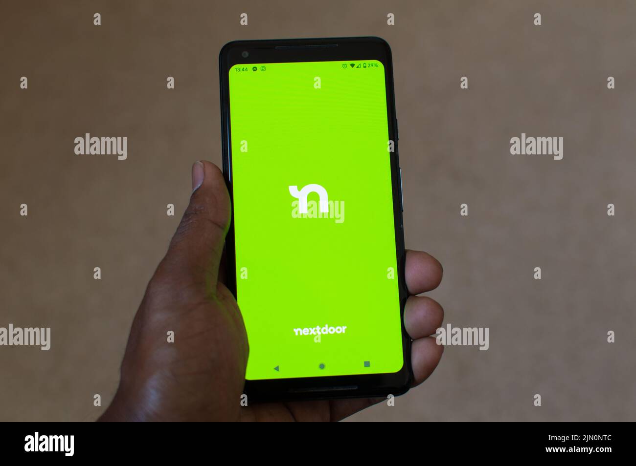Nextdoor app on smartphone Stock Photo