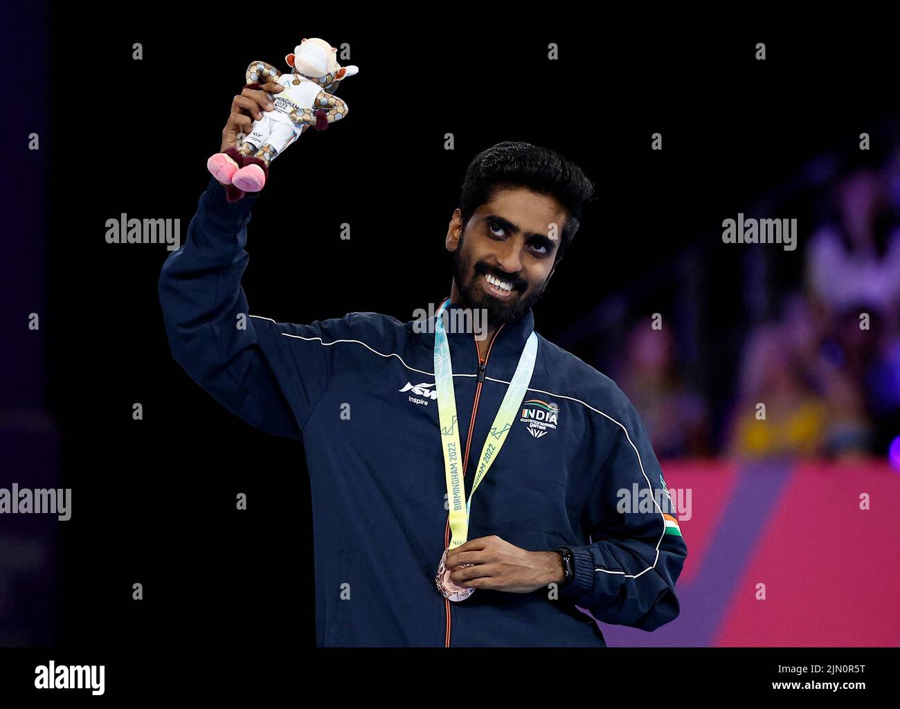 Commonwealth Games - Table Tennis - Men's Singles - Medal Ceremony - The NEC Hall 3, Birmingham, Britain - August 8, 2022 Bronze medallist India's Sathiyan Gnanasekaran celebrates on the podium during the medal ceremony REUTERS/Jason Cairnduff Stock Photo